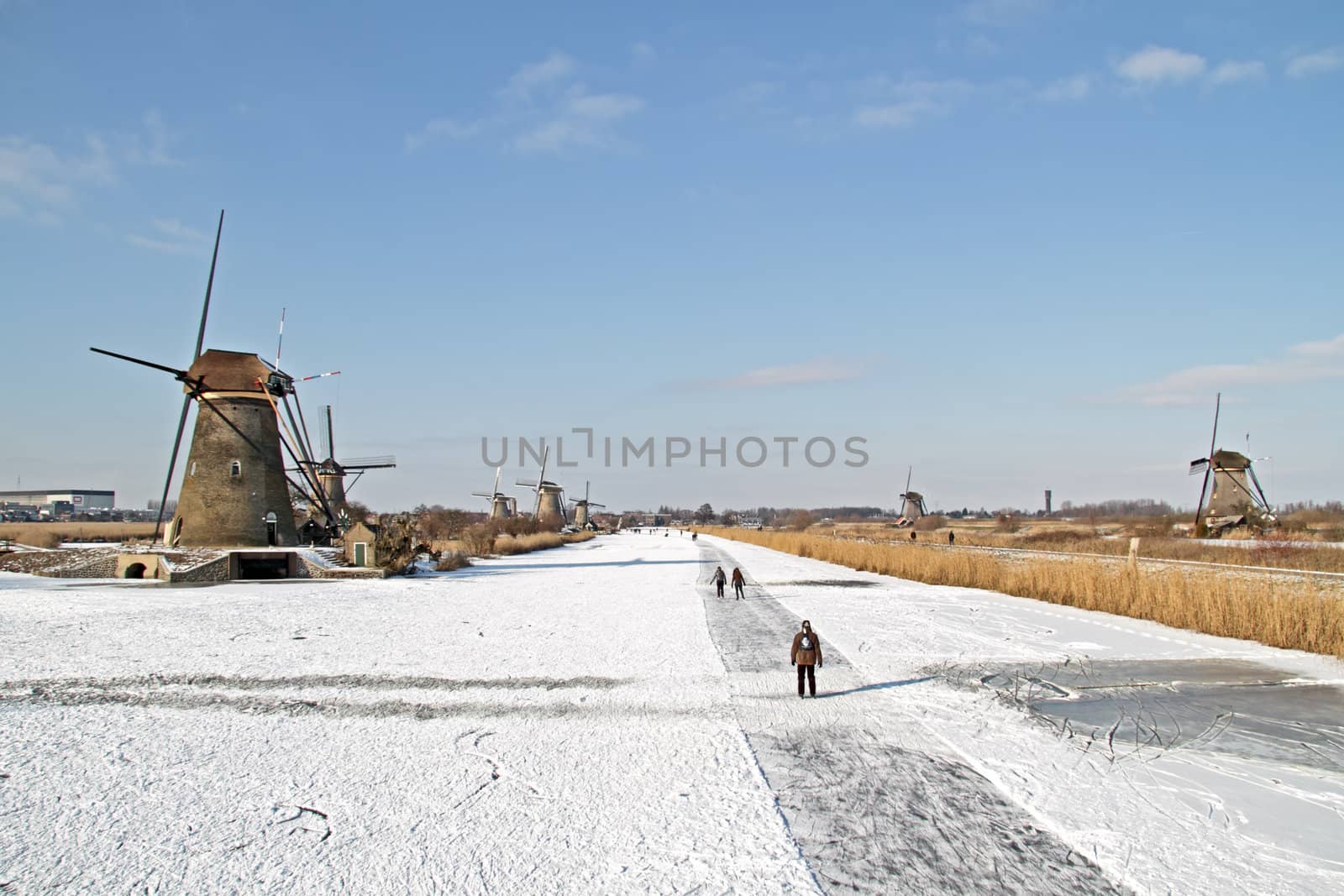 Ice skating at Kinderdijk in the winter in the Netherlands