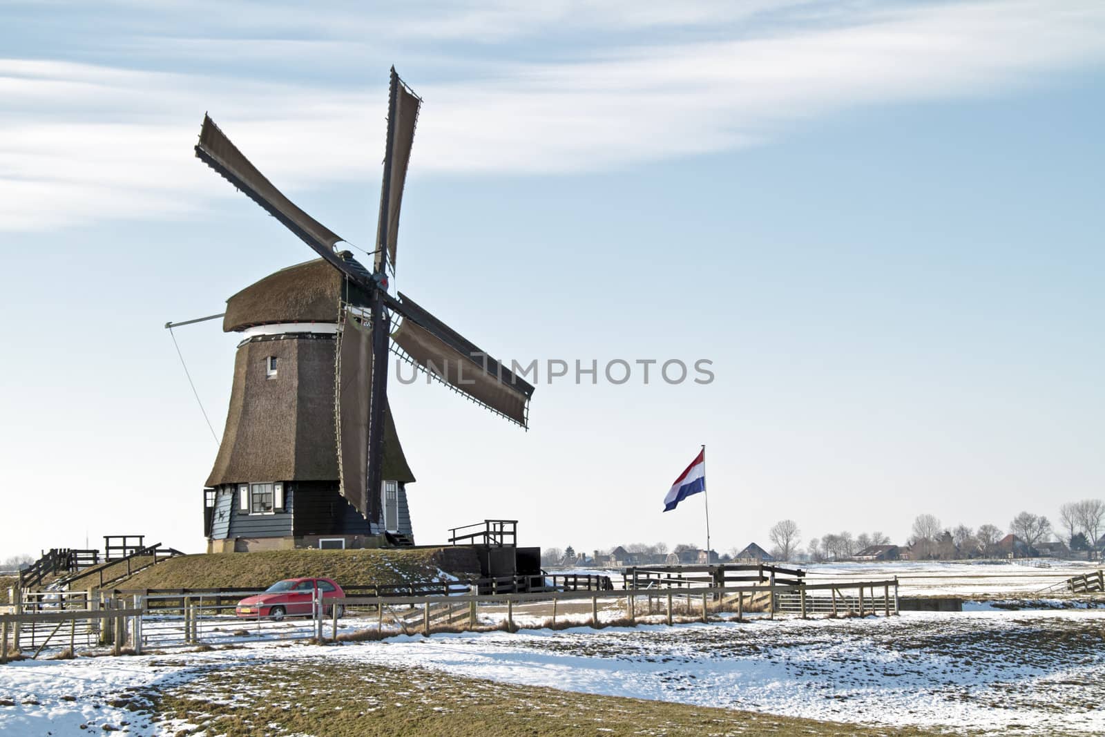 Ancient windmill in the countryside from the Netherlands in winter