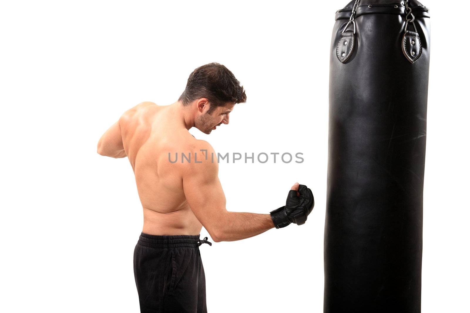 young boxer exercising on a boxing bag isolated on a white background