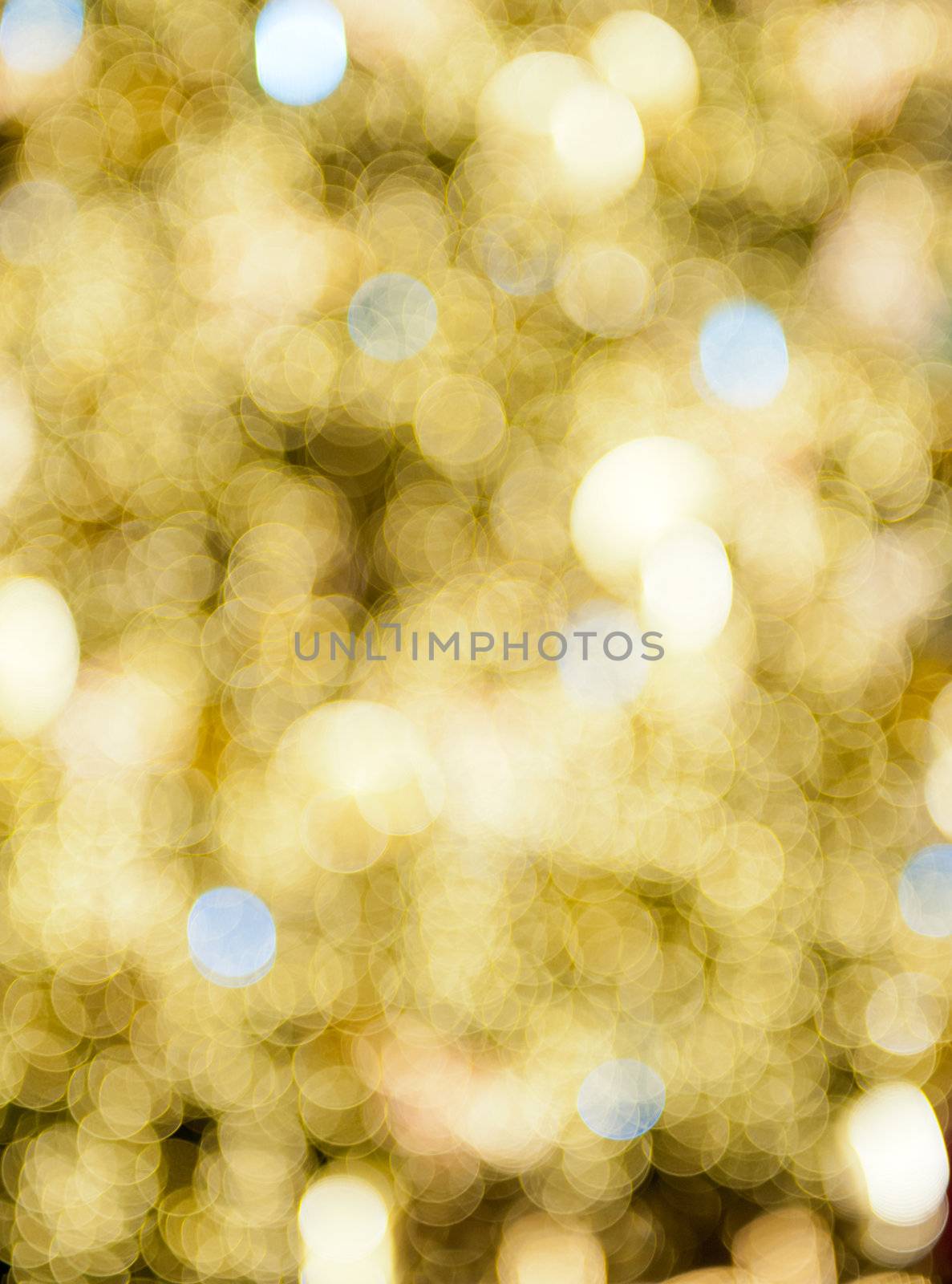 Beautiful vivid defocused christmas background. Major color is gold the other add the Christmas twinkle atmosphere