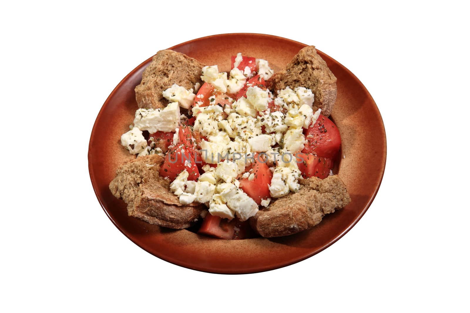 salad with feta cheese and tomato served on a plate