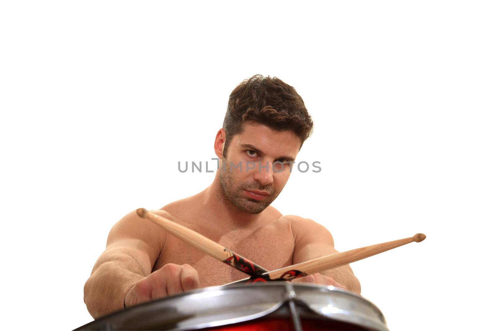 young male drummer isolated on a white background