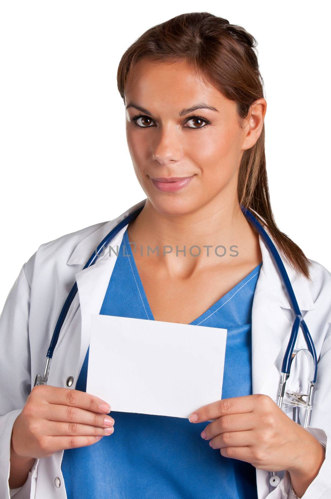 Young female doctor with a stethoscope holding a white card isolated in a white background