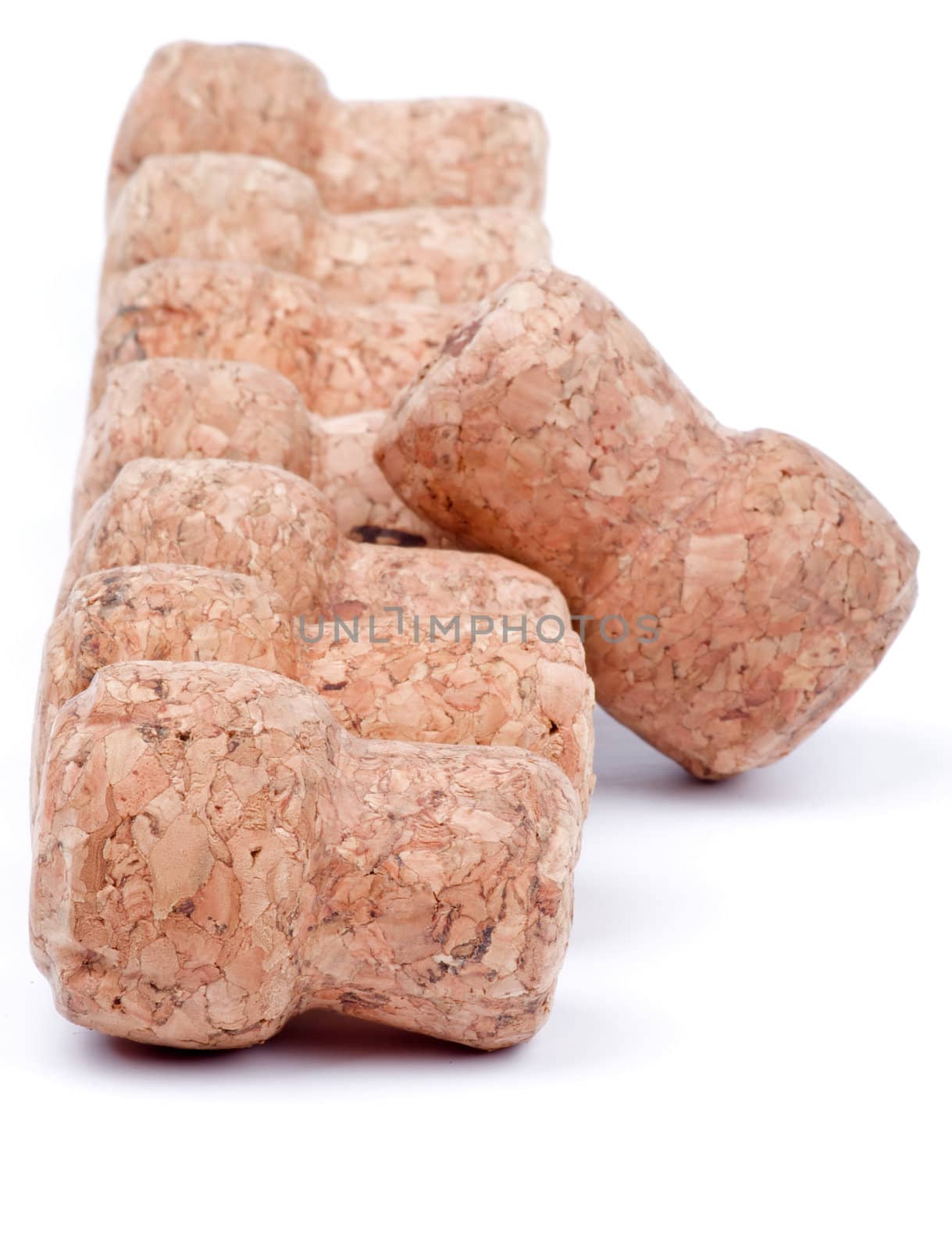 Cortical Champagne Corks in a Row isolated on white background