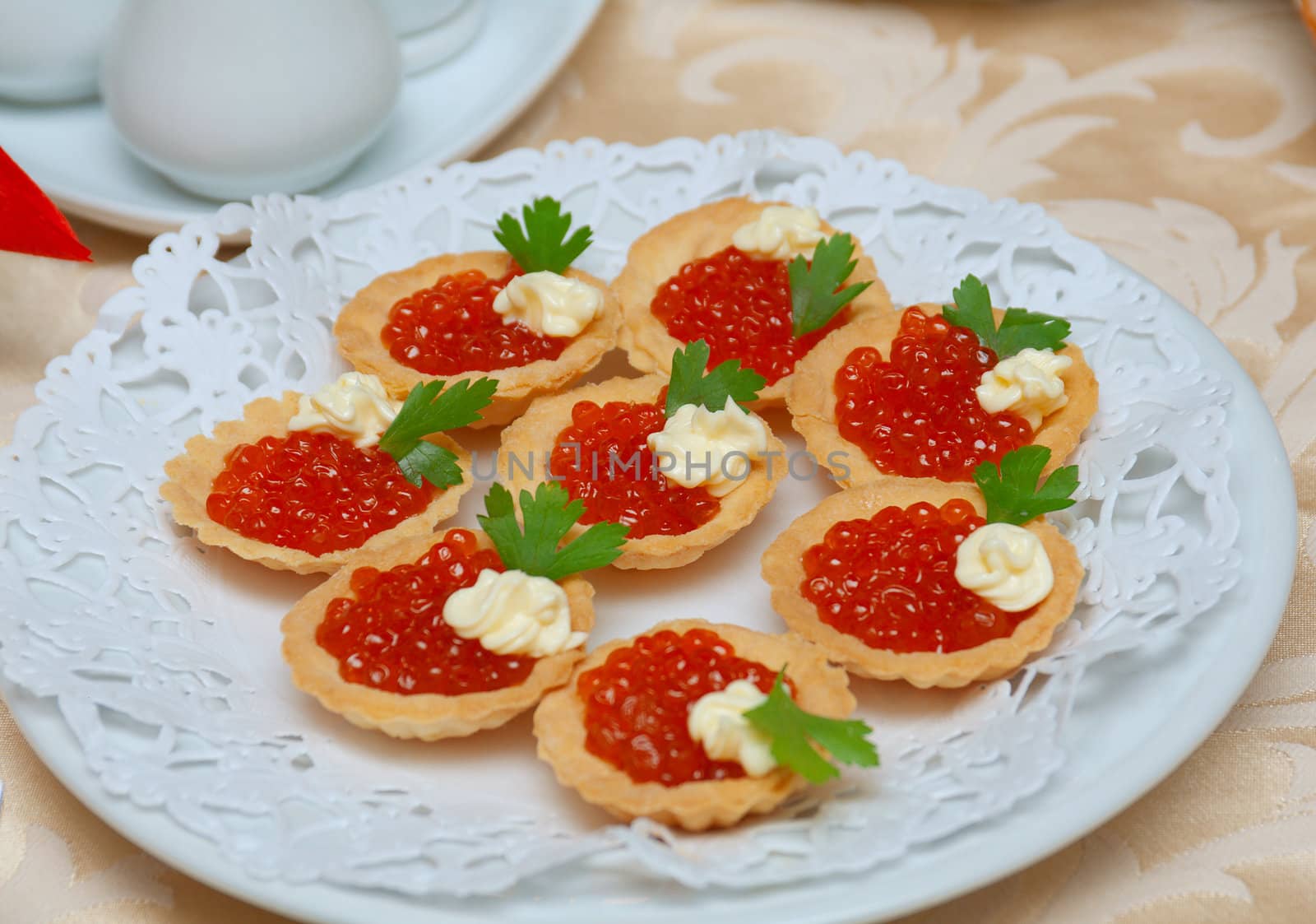    Tartlet with red caviar   . Shallow depth-of-field