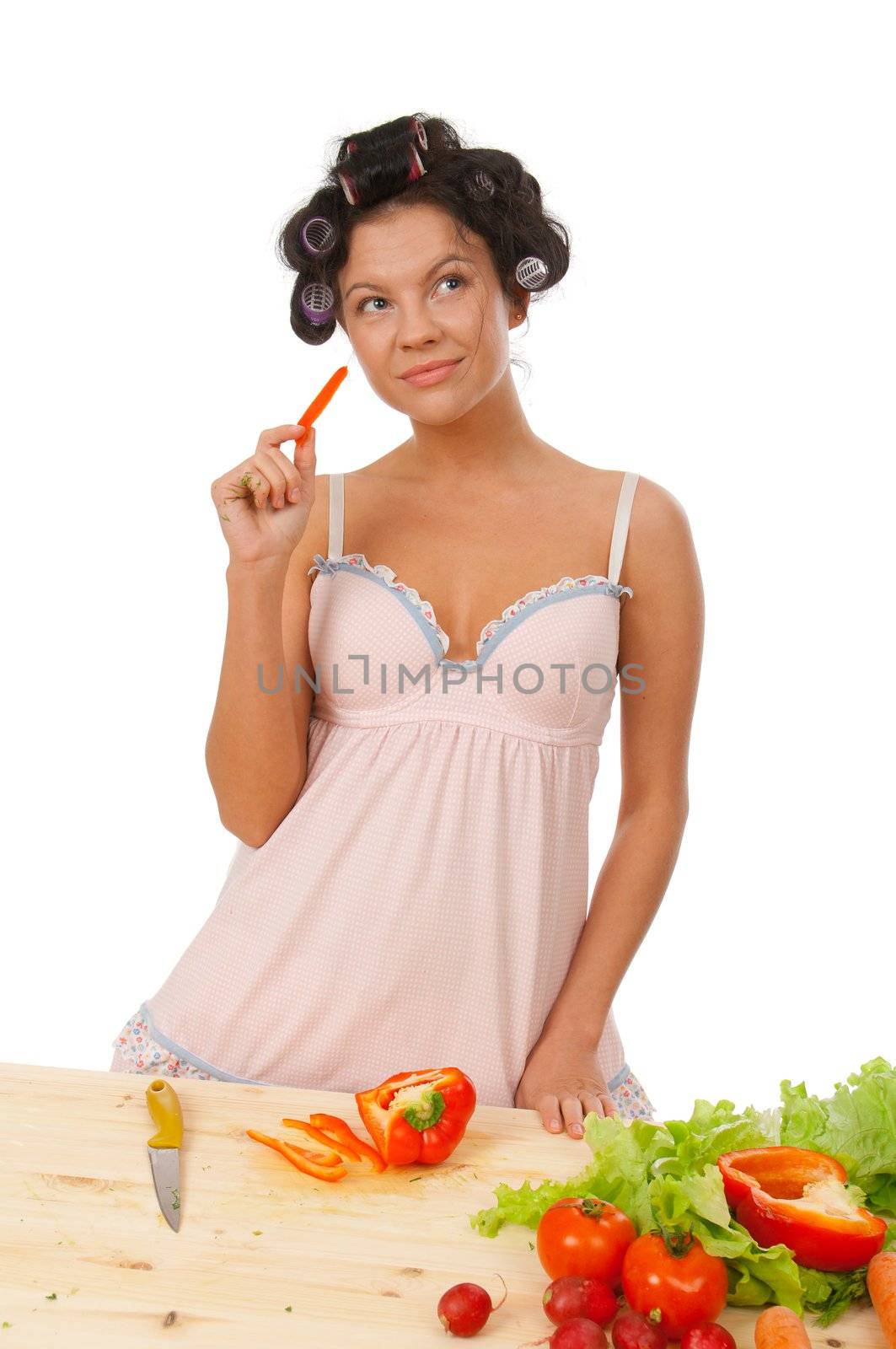 housewife preparing  paprika .Studio, white background. 