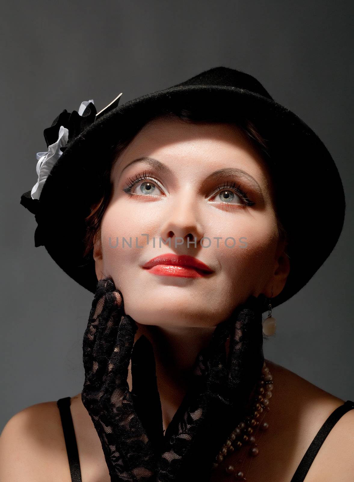 Woman retro revival portrait.girl in hat