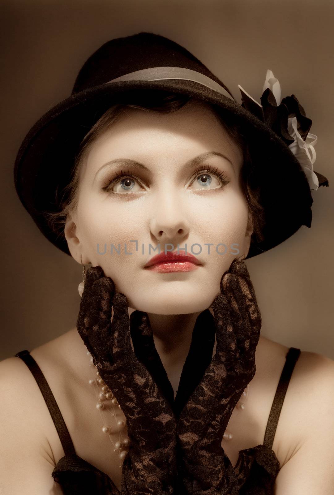 Woman retro revival portrait.girl in hat