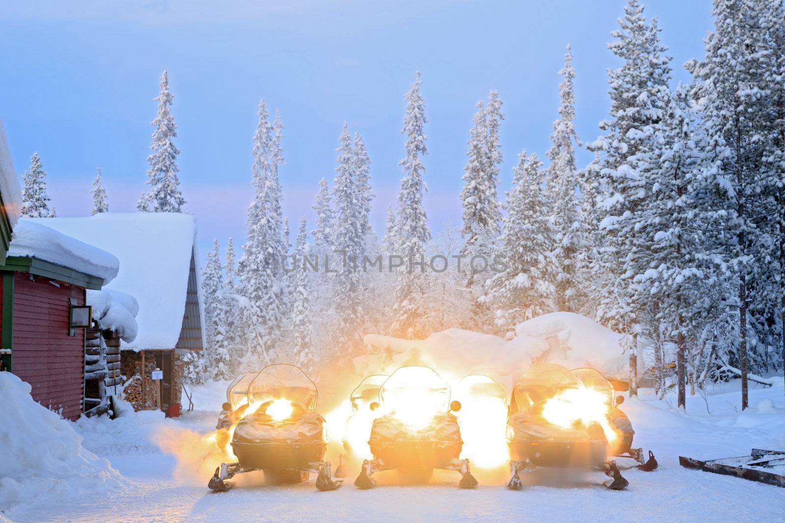 Snowmobile parking on snow in Kiruna Sweden