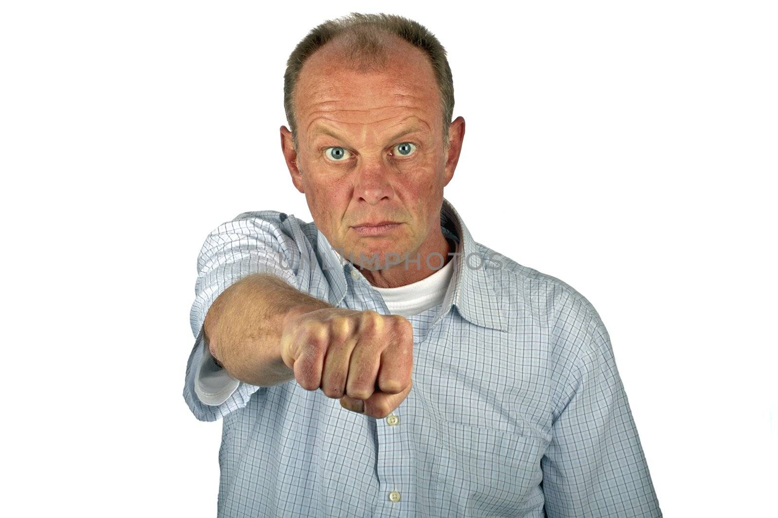 Aggressive man showing his fist on a white background