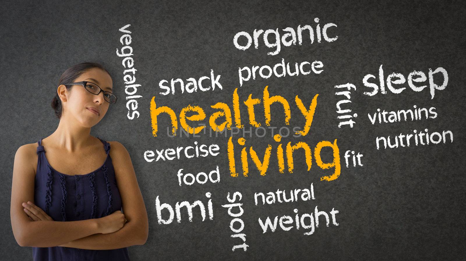 Woman standing next to a Healthy Living word illustration.