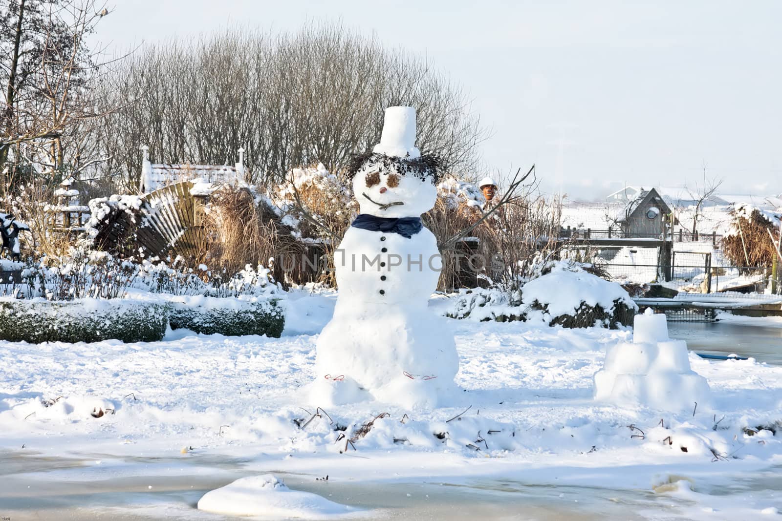 Traditional snowman in wintertime in the Netherlands