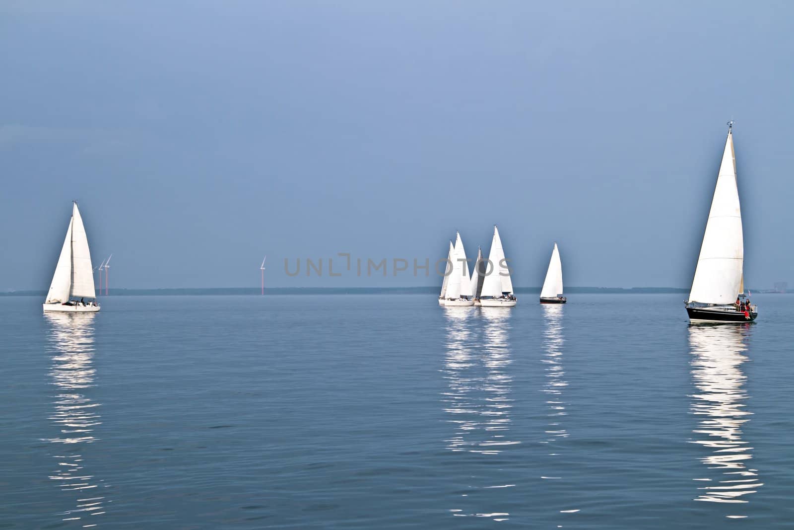 Sailing on the IJsselmeer at sunset in the Netherlands by devy