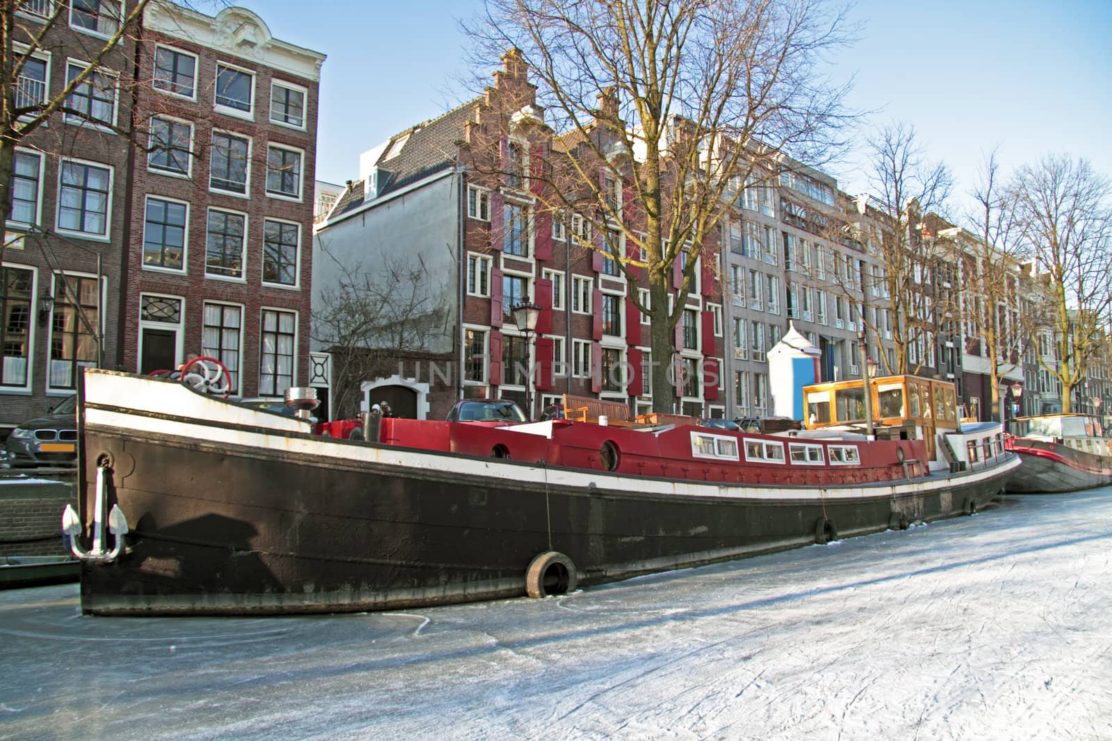 Amsterdam innercity in winter in the Netherlands by devy