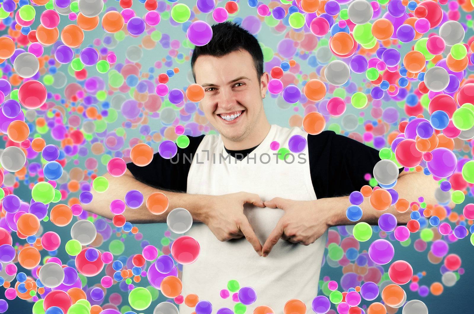 Young man making heart sign with palms by silent47