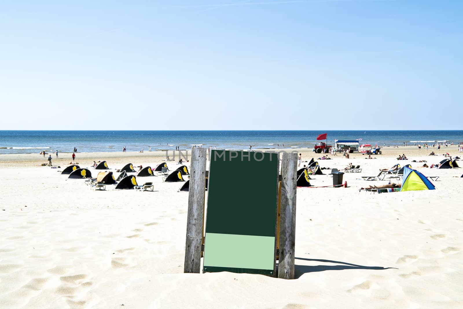 Sign on the beach at the north sea in the Netherlands