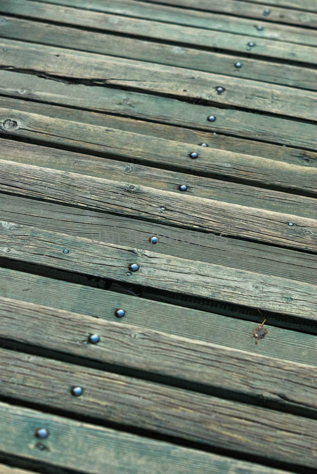 Old wooden green vintage stairs as background. Small Depth of Field