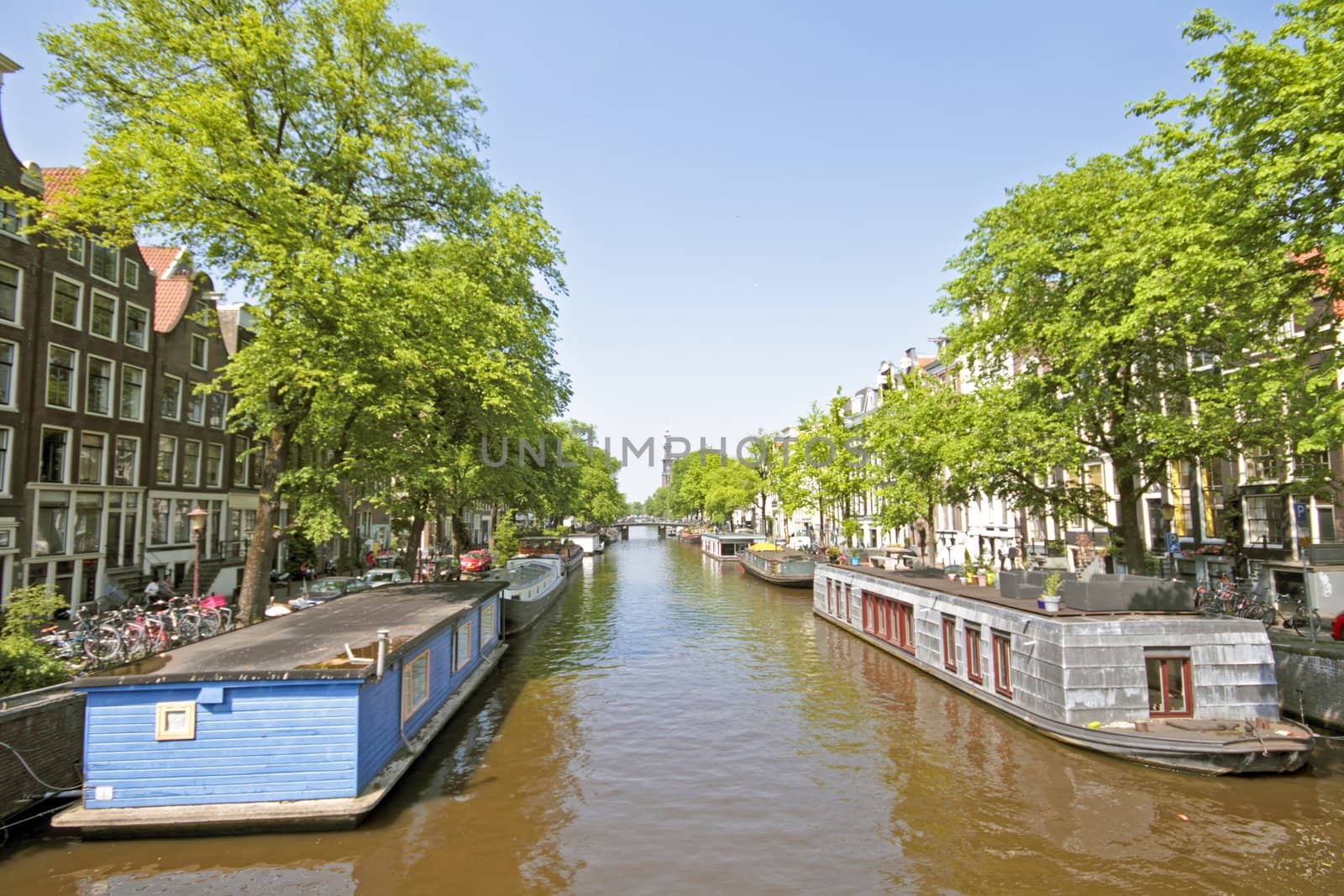Houseboats in the canals in Amsterdam the Netherlands