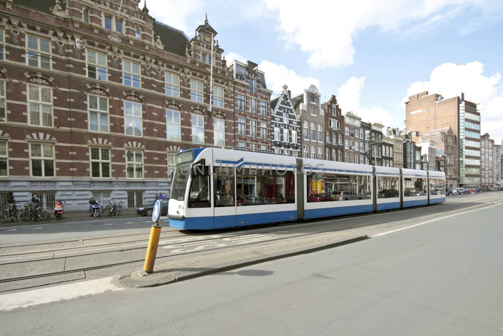 Tram driving in Amsterdam city center in the Netherlands