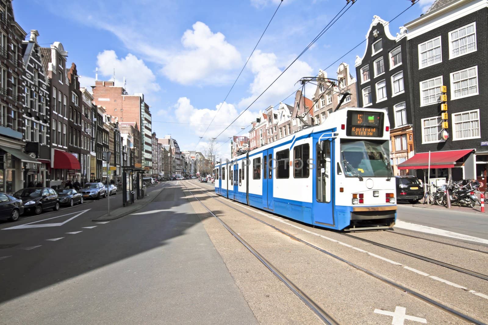 Tram driving in Amsterdam city center in the Netherlands