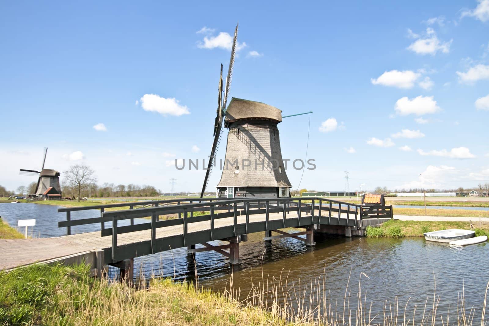 Traditional windmills in dutch landscape in the Netherlands