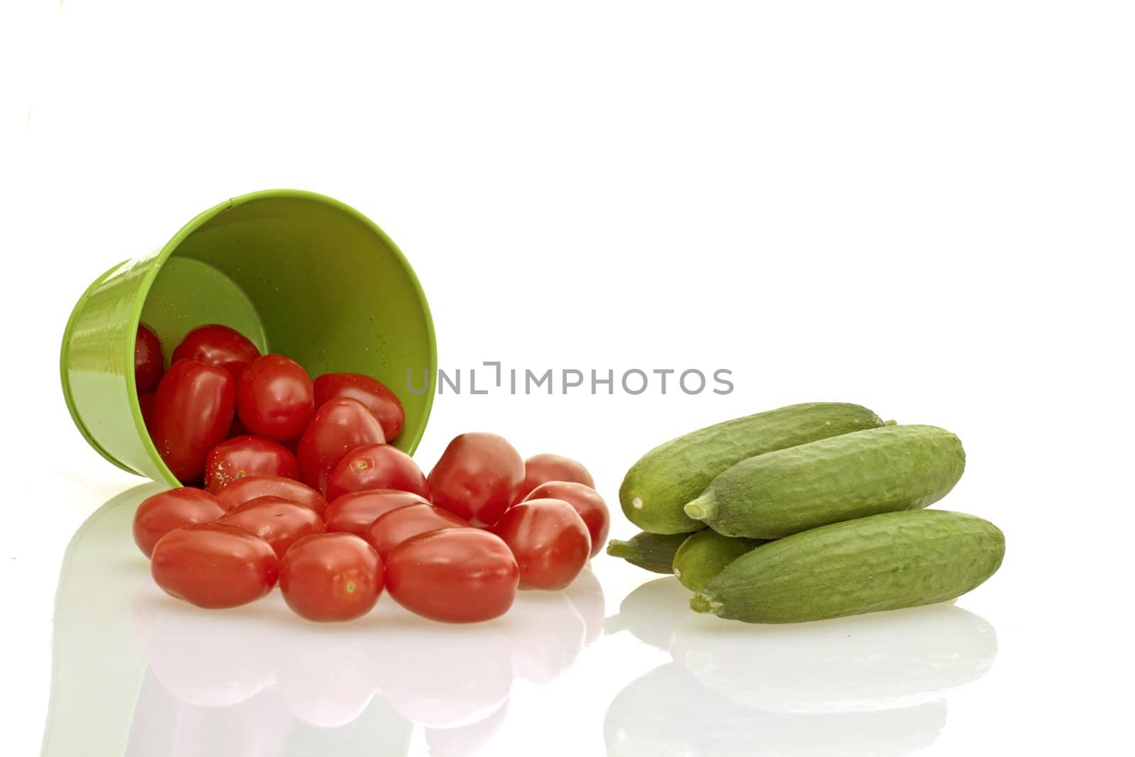 Tomato, cucumber vegetable in a bucket