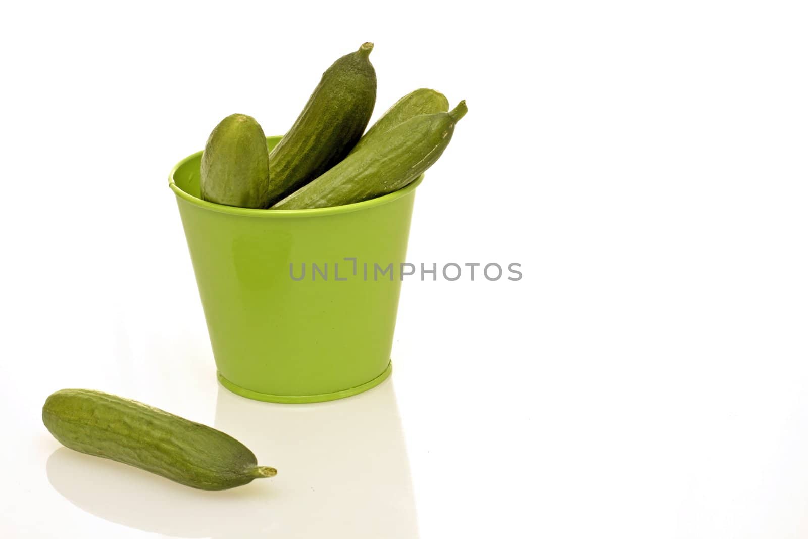 Cucumbers in a green bucket