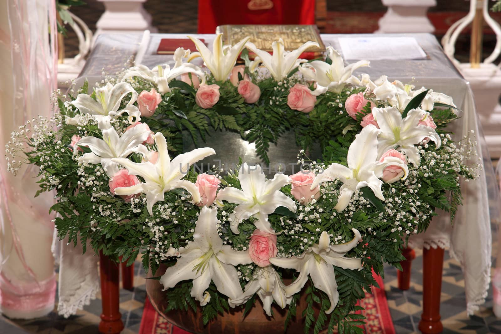 decoration with flowers on a christening bowl