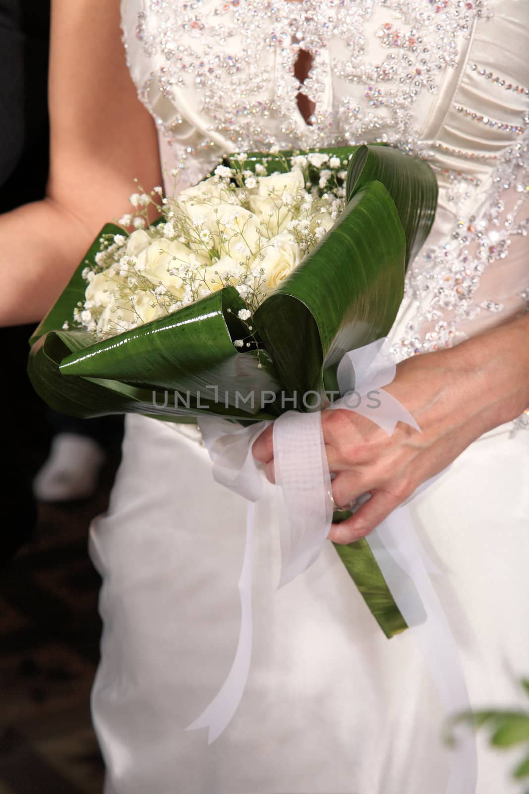 Bride holding her bouquet at the wedding
