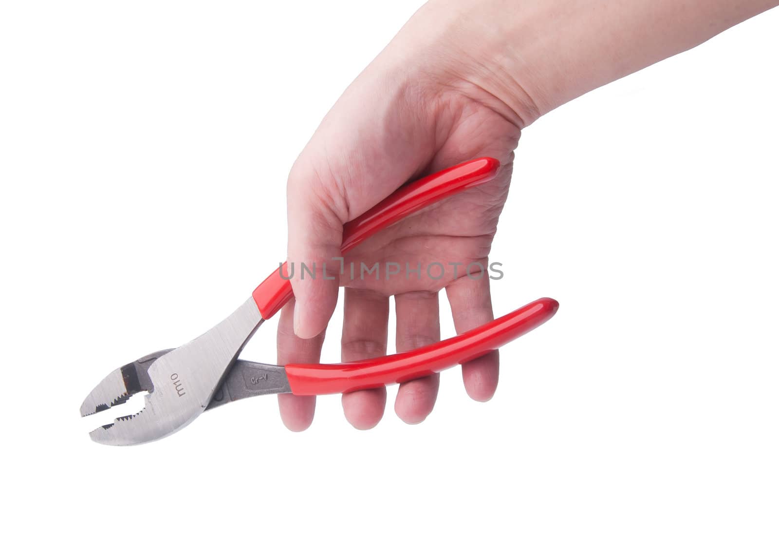 Pliers. Pliers in hand on the background