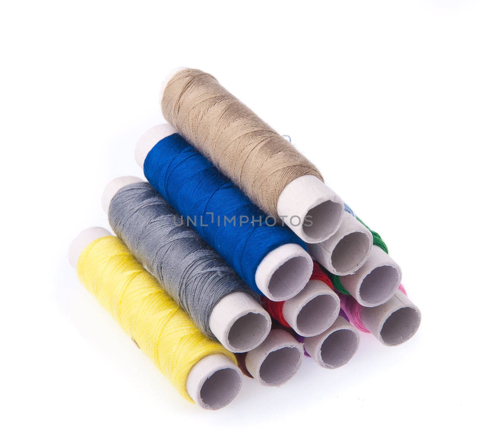 bobbins of thread on the background