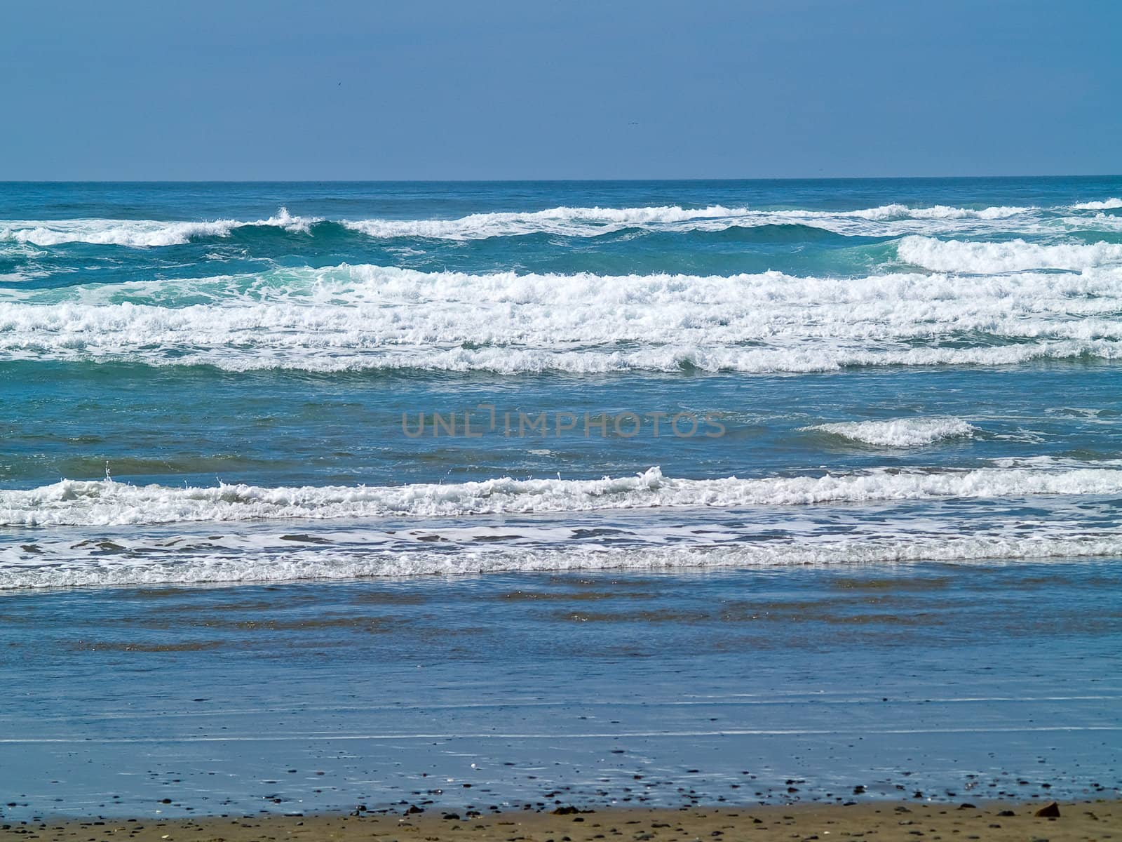 Ocean Waves on the Shore on a Clear, Sunny Day by Frankljunior