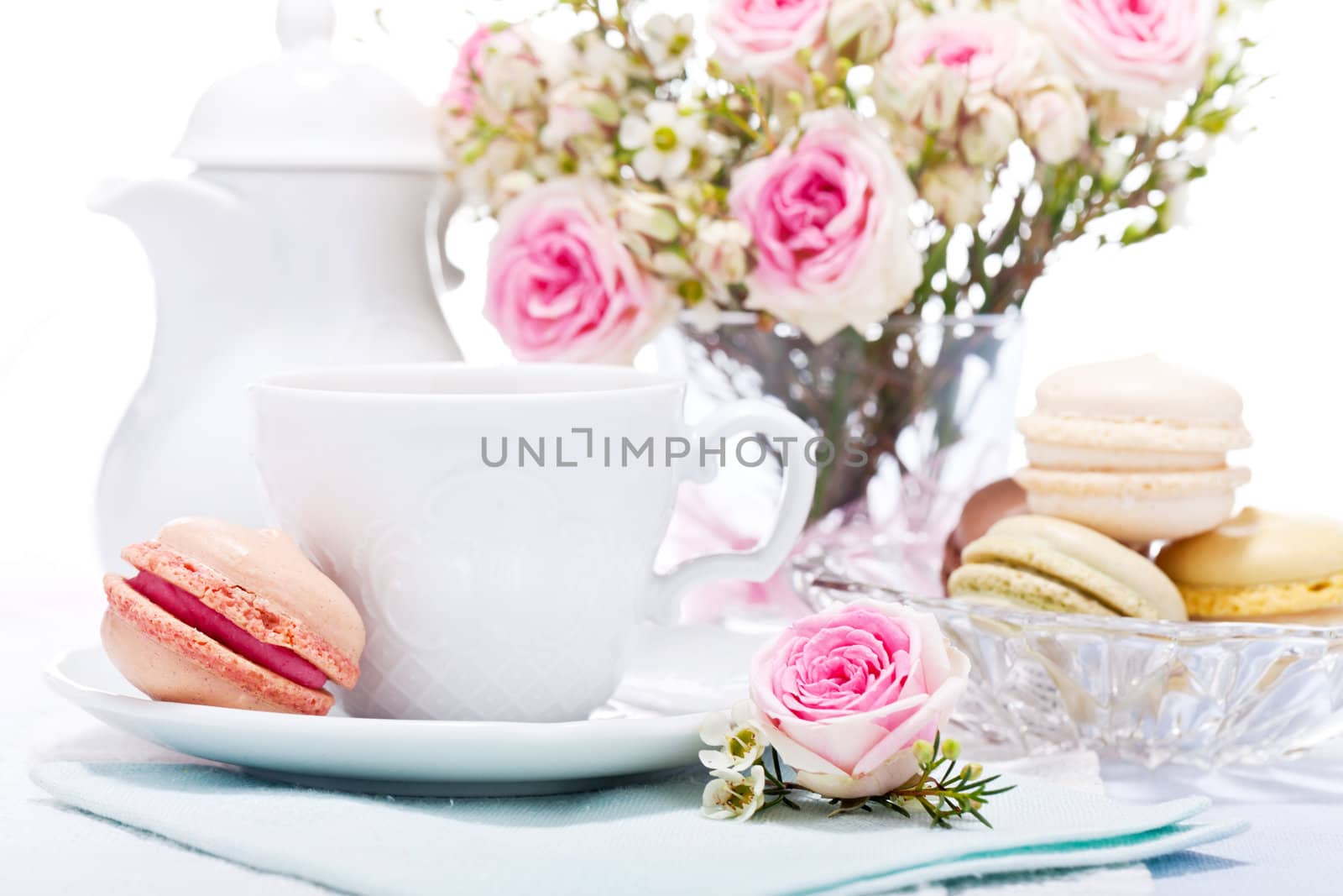 traditional delicious sweet dessert macarons and coffee on table
