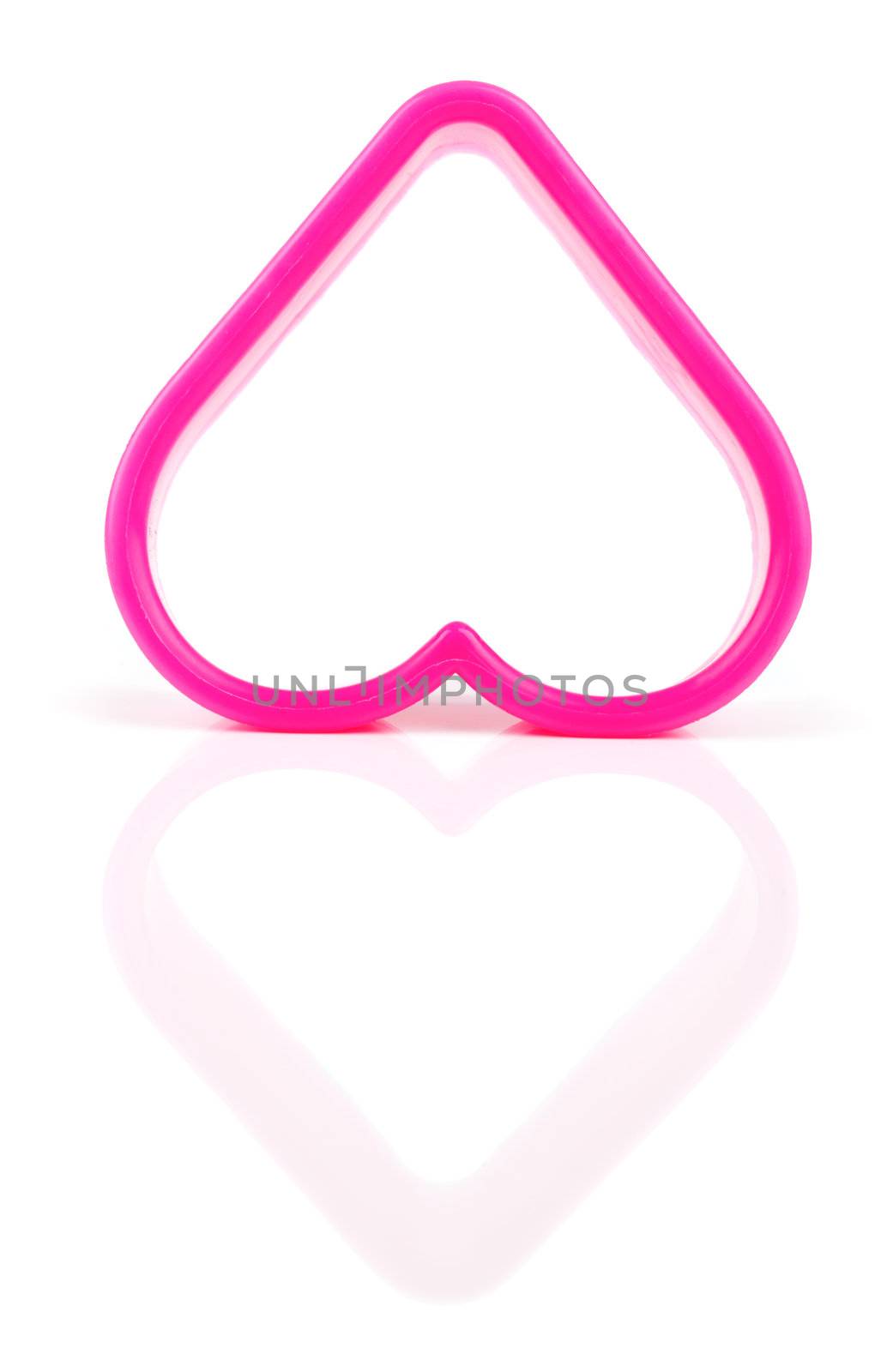  heart shaped cookie cutter on a white background by motorolka