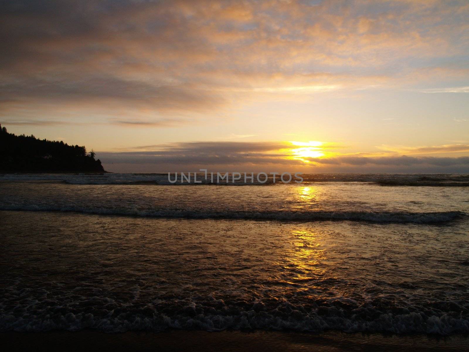 Beautiful Sunset Over the Ocean wth Waves in the Foreground by Frankljunior