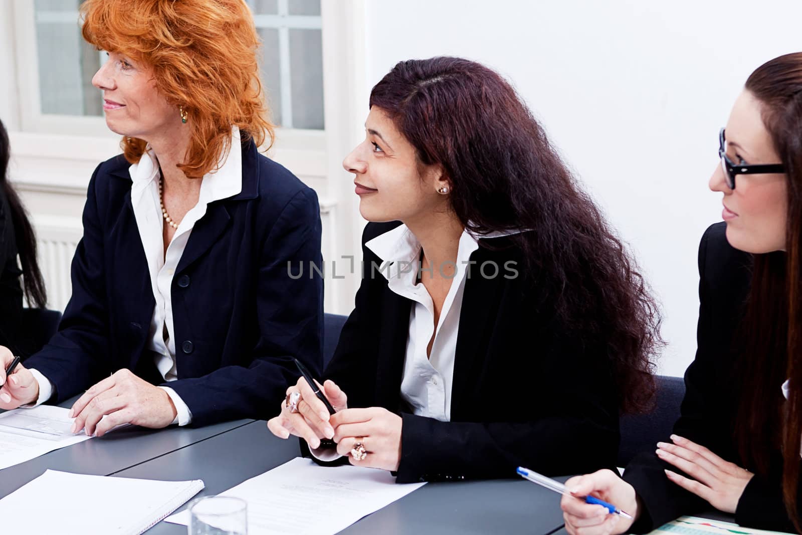 business team on table in office conference seminar presentation