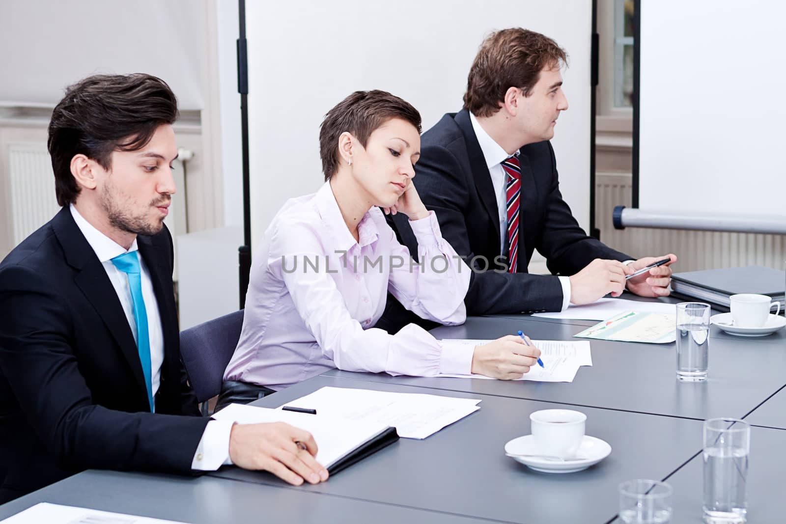 business team on table in office conference seminar presentation