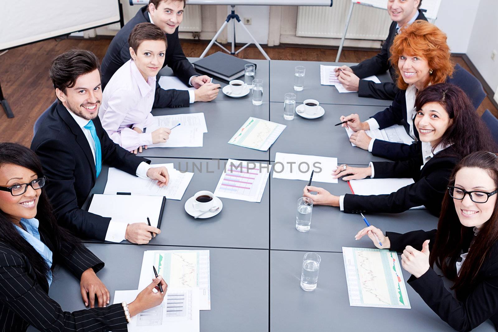 business team on table in office conference seminar presentation