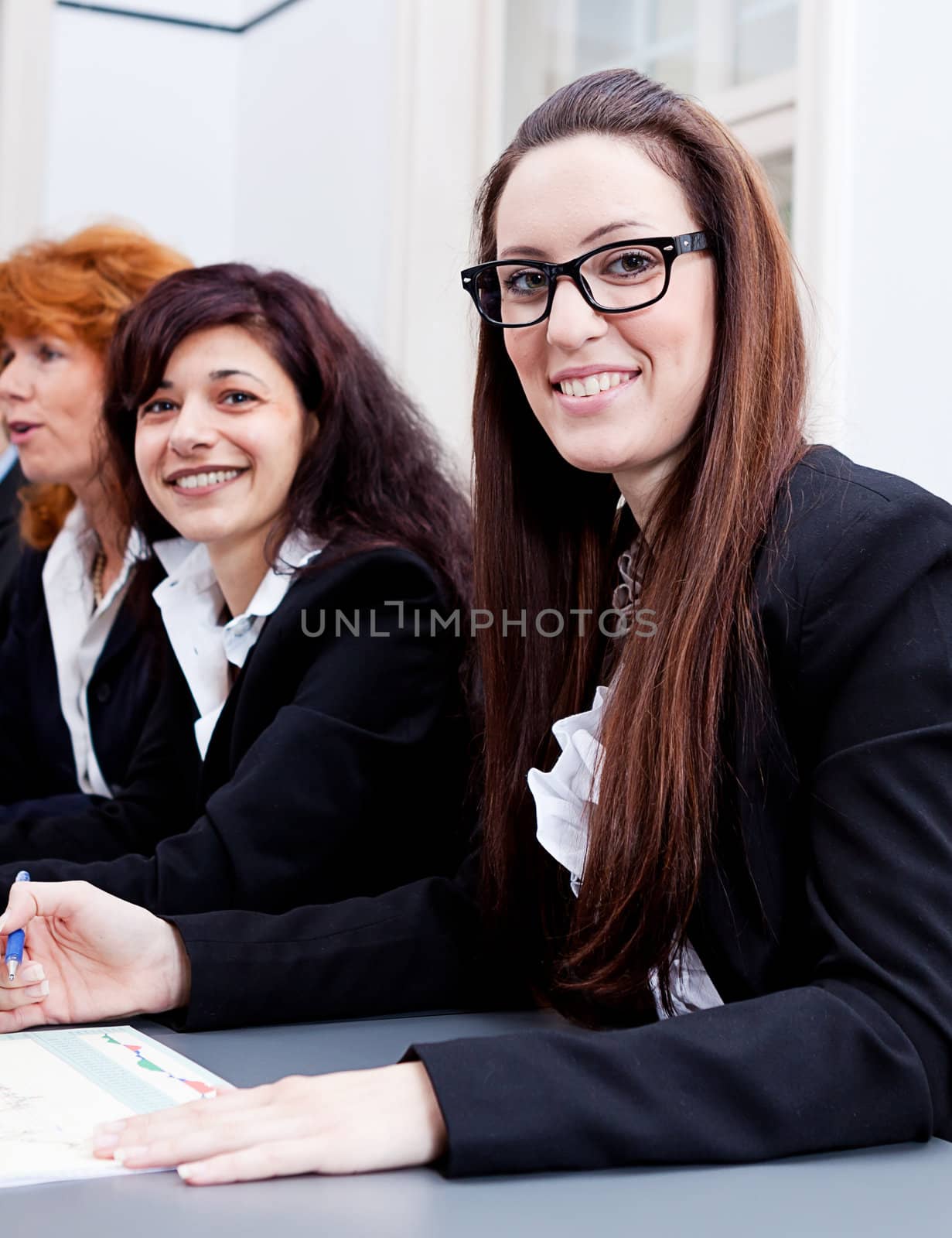 business team on table in office conference seminar presentation