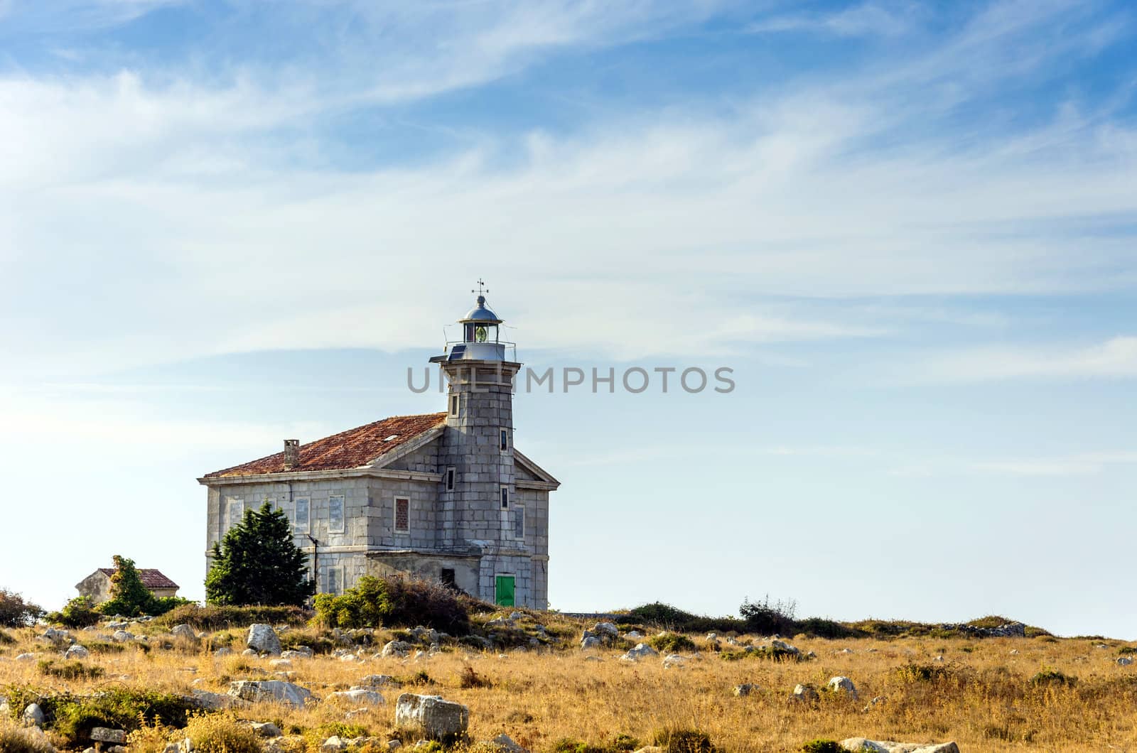 Abandoned lighthouse on a small island in Croatian Kornates, island Trstenik, Croatia.