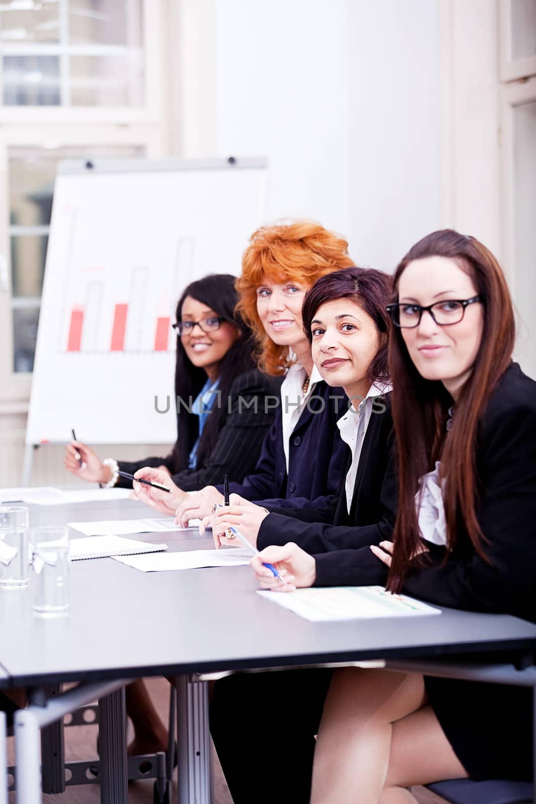 business team on table in office conference seminar presentation