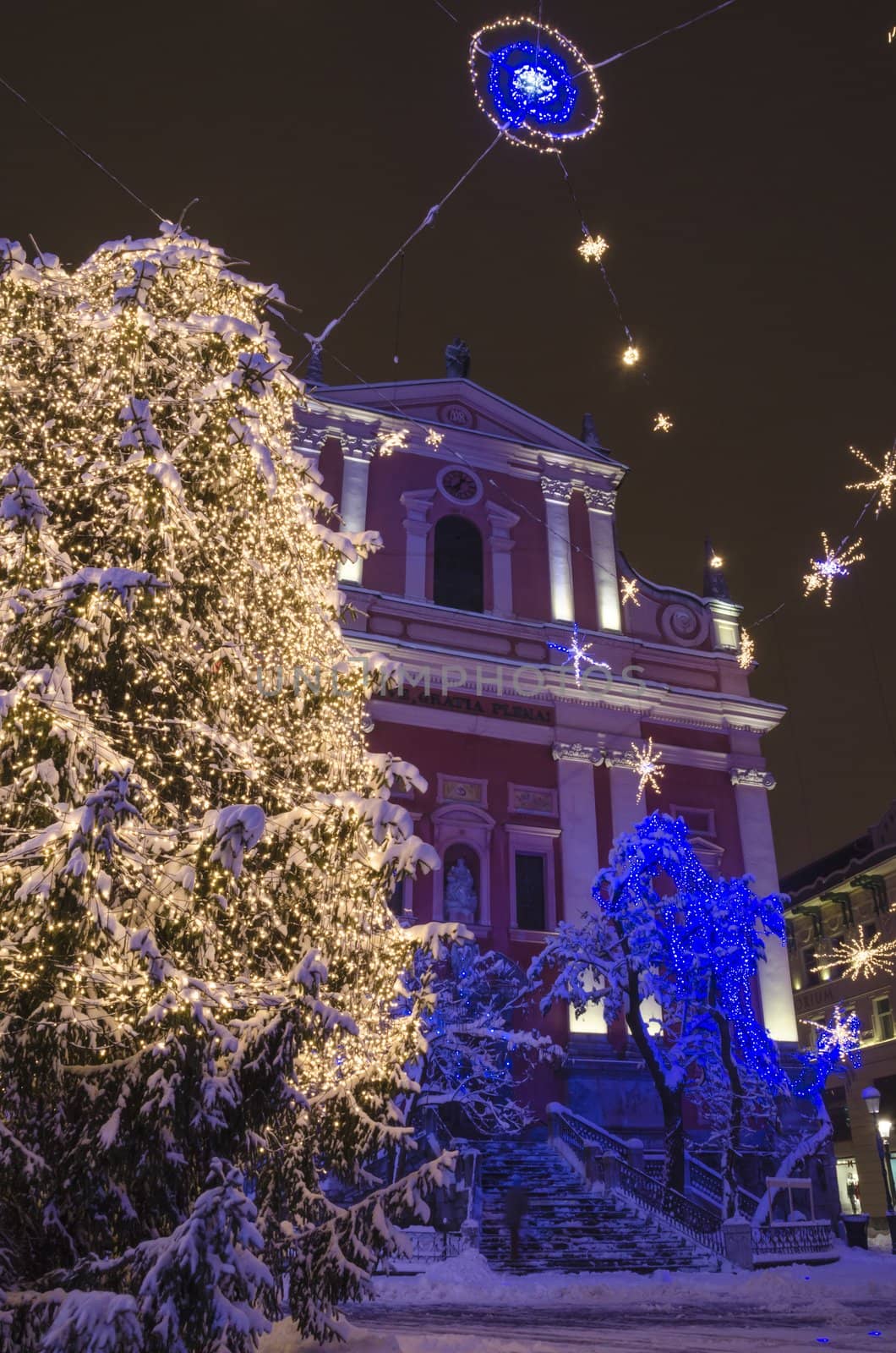 Christmas tree on Preseren square with church behind. Ljubljana, Slovenia, on December 8, 2012.