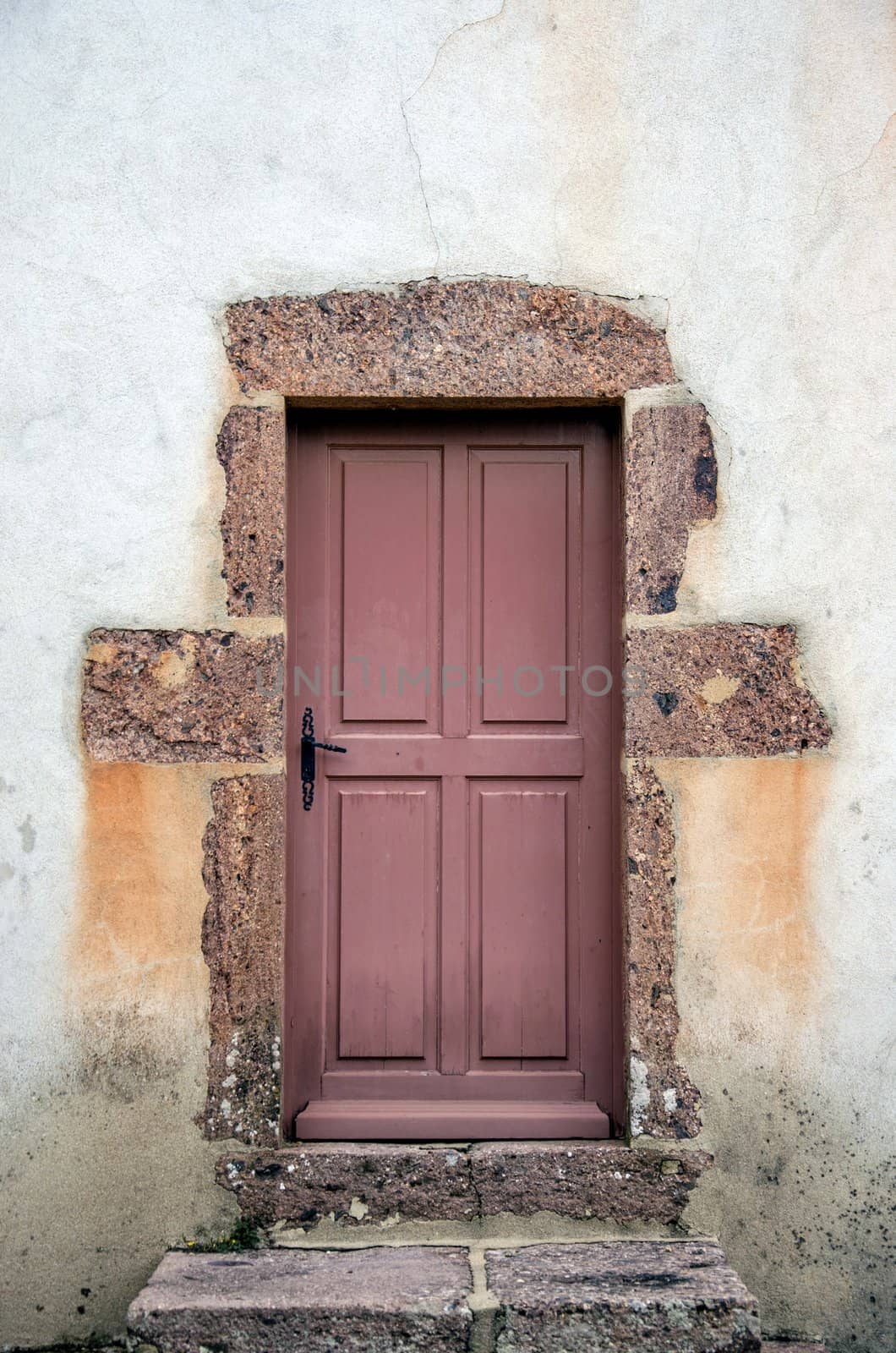 Old church side doors, Perrigny sur Loire, France. 