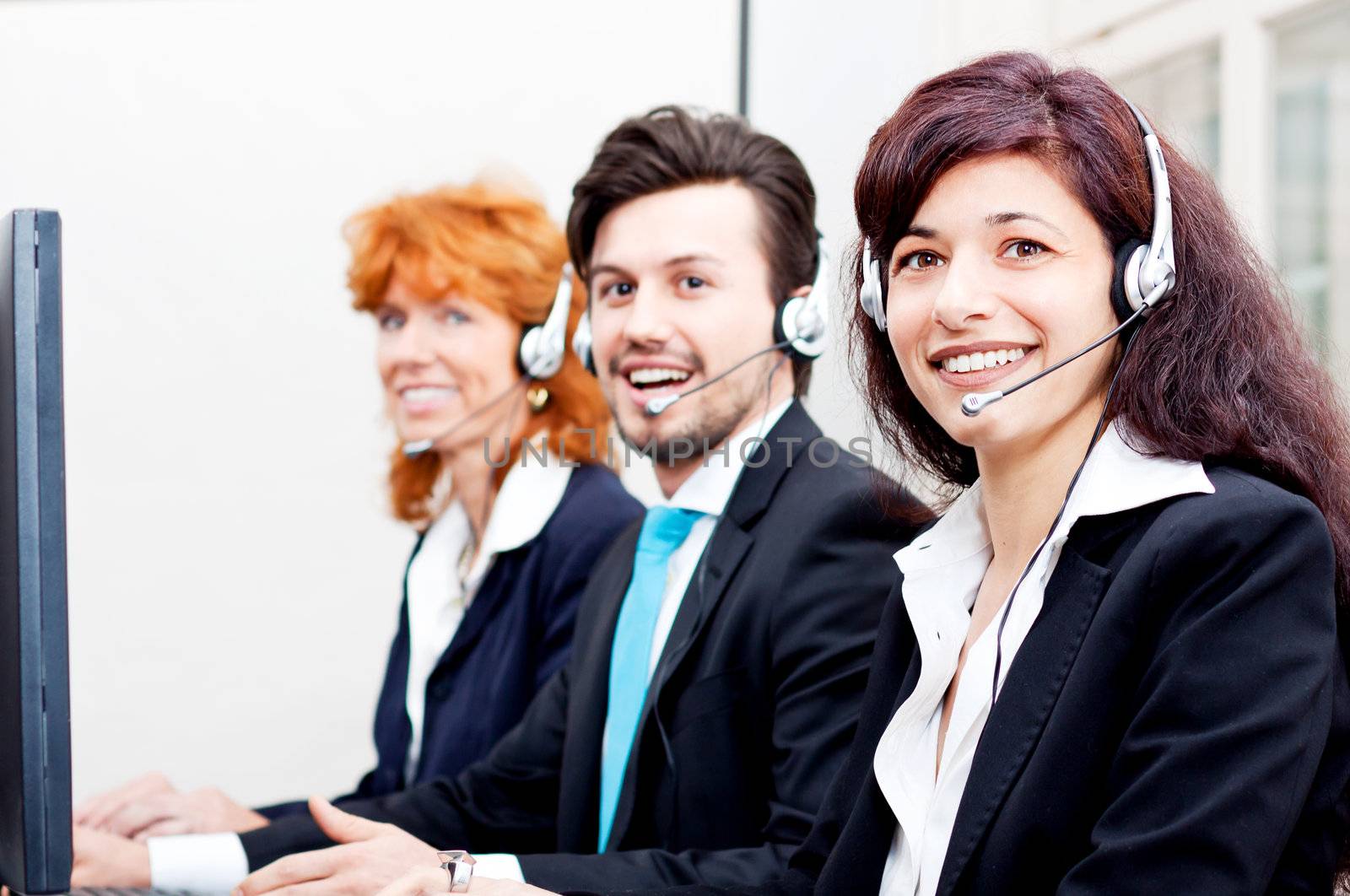 smiling callcenter agent with headset support by juniart