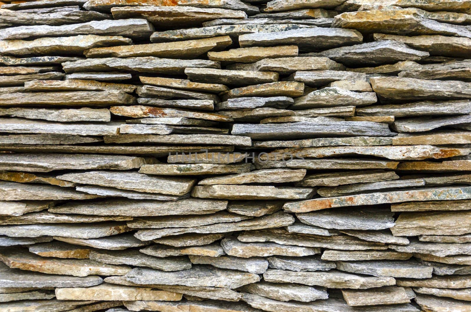Stacked stone tiles for exterior use.