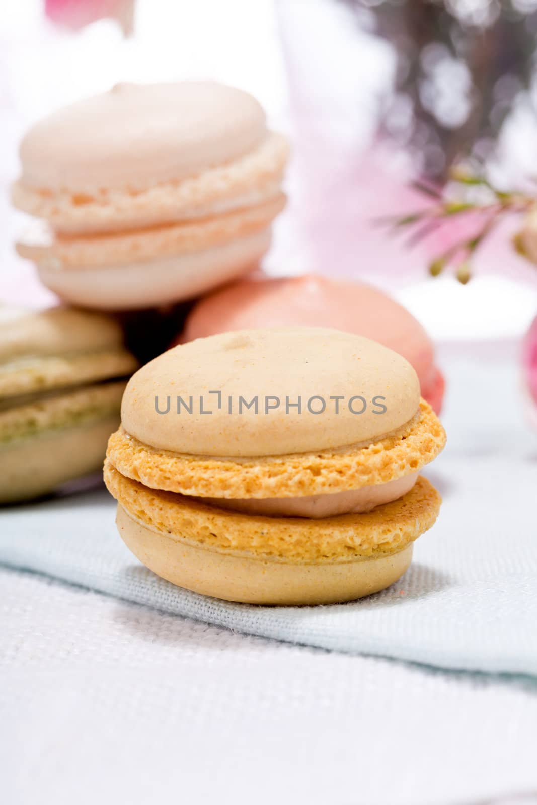 traditional delicious sweet dessert macarons and coffee on table