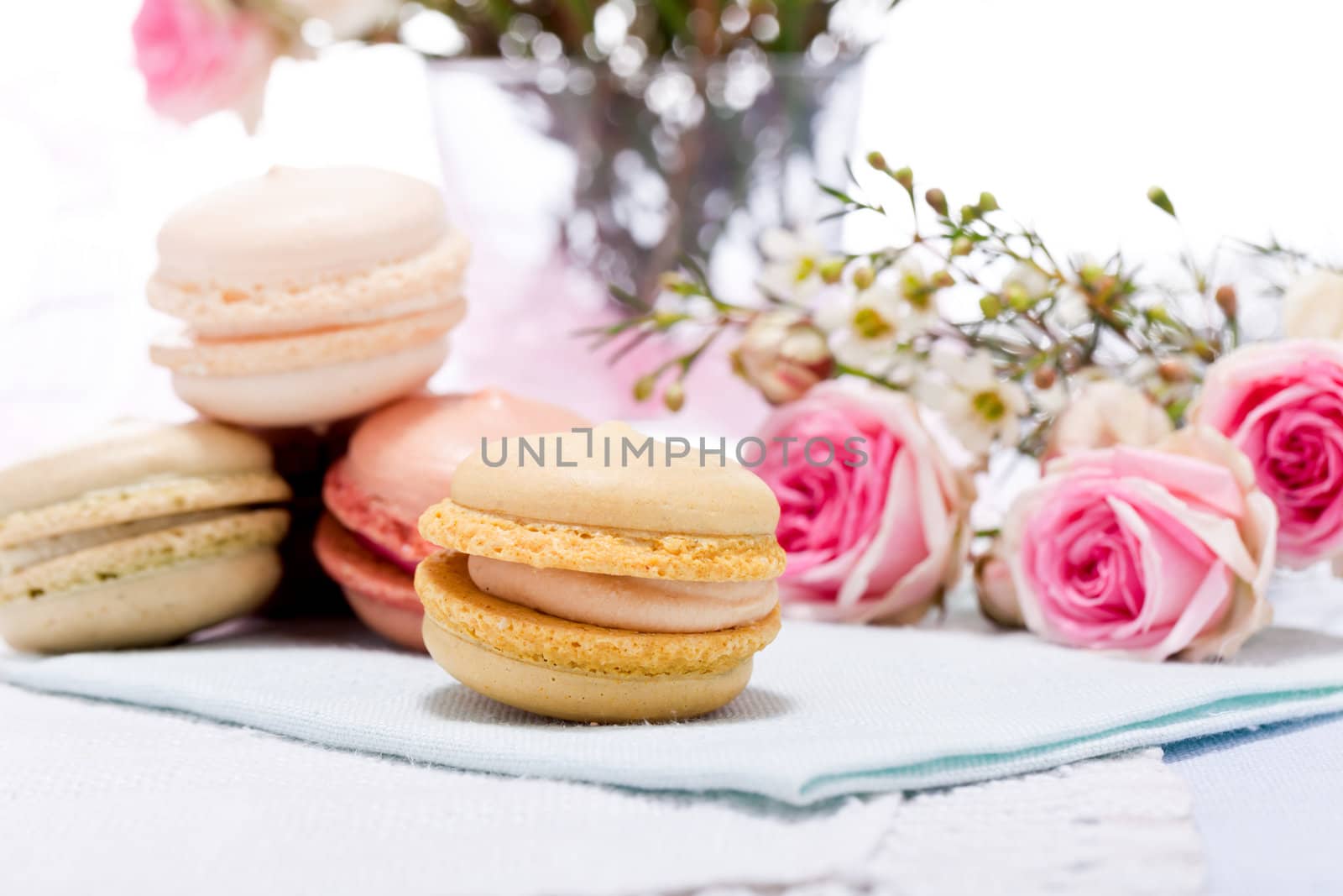 traditional delicious sweet dessert macarons and coffee on table