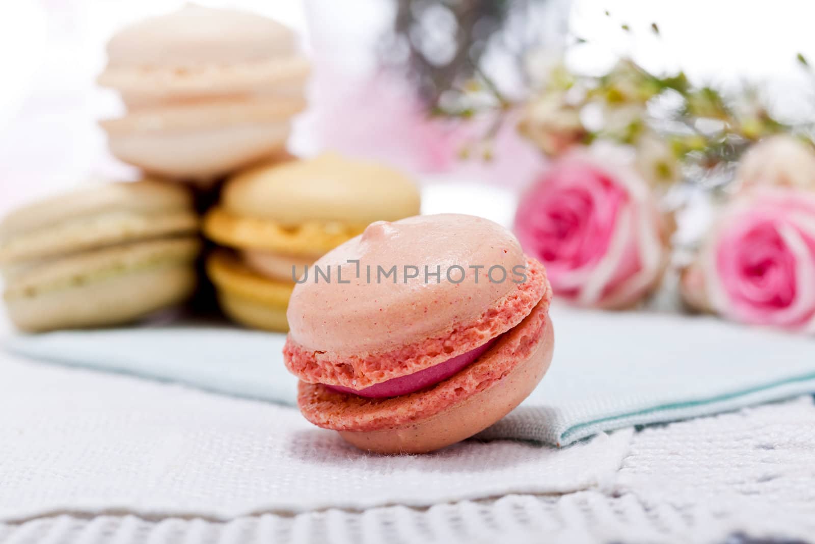 traditional delicious sweet dessert macarons and coffee on table