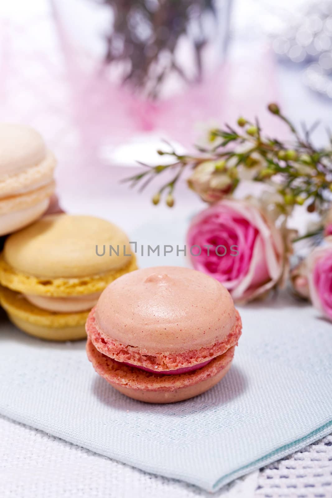 traditional delicious sweet dessert macarons and coffee on table