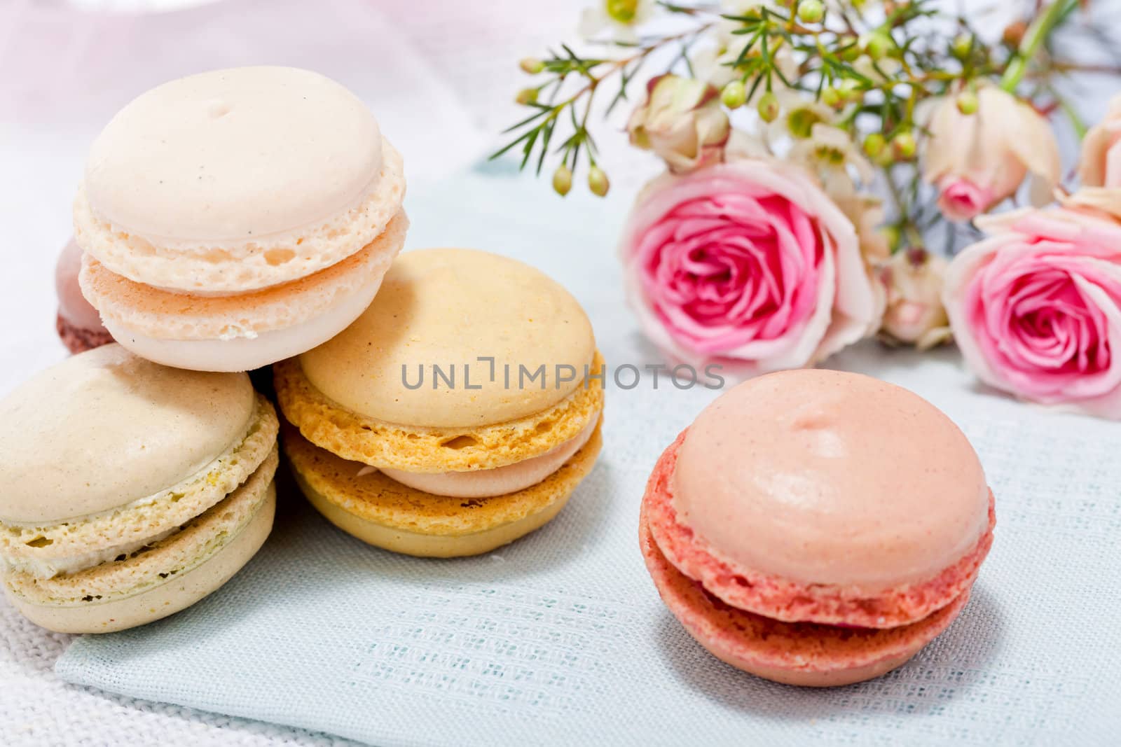 traditional delicious sweet dessert macarons and coffee on table